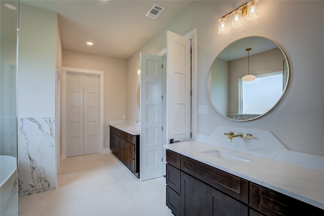 bathroom featuring vanity and tile patterned floors