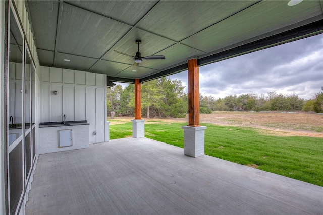 view of patio / terrace with sink and ceiling fan