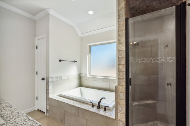 bathroom featuring tile patterned floors, independent shower and bath, and ornamental molding