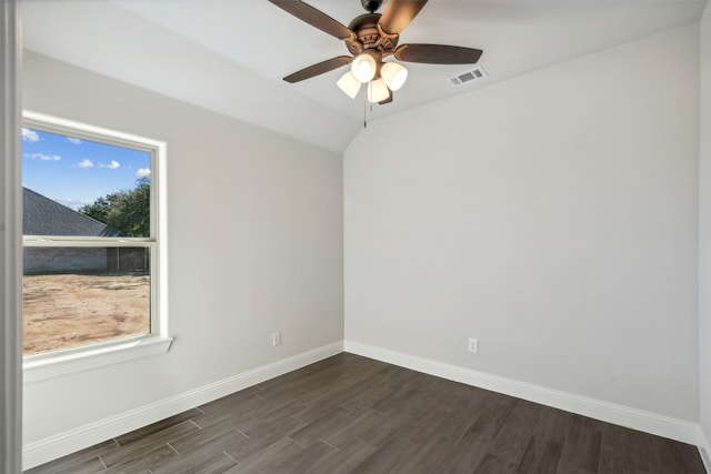 empty room with dark hardwood / wood-style floors and ceiling fan