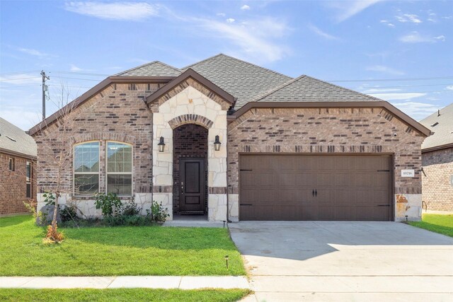 doorway to property with a garage