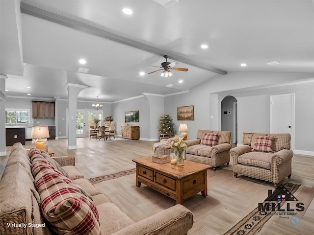 living room with crown molding, ceiling fan with notable chandelier, light wood-type flooring, and vaulted ceiling with beams