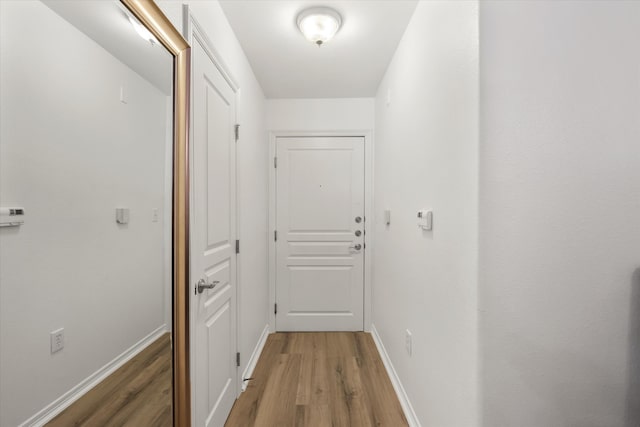 hall featuring dark hardwood / wood-style floors