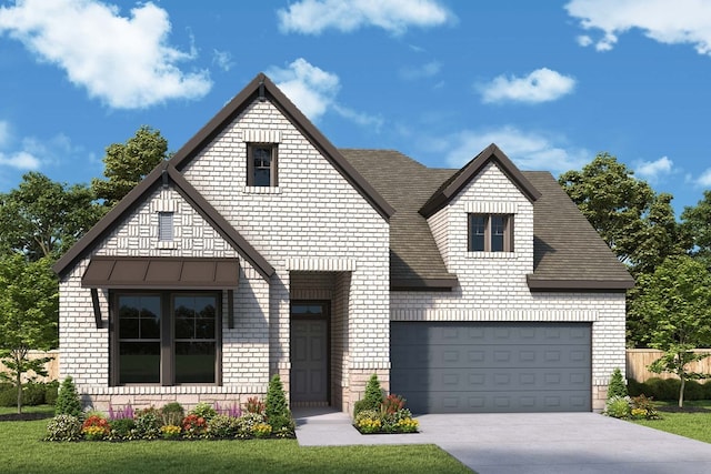 view of front of property featuring a front lawn and a garage