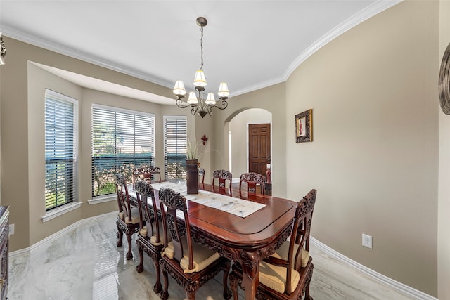 kitchen featuring ornamental molding, tasteful backsplash, light stone counters, and an inviting chandelier