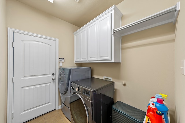 bathroom with vanity, tiled shower / bath, and tile patterned floors