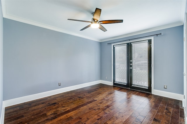 empty room with dark hardwood / wood-style floors, ceiling fan, and ornamental molding