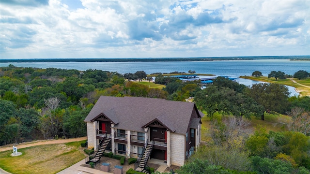 birds eye view of property featuring a water view