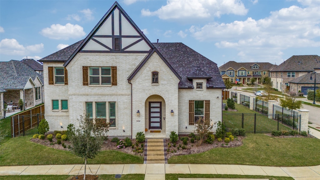 view of front of home with a front lawn