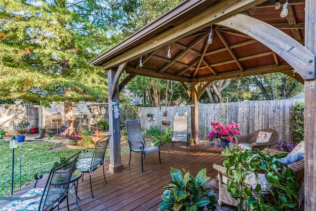 wooden terrace with a gazebo