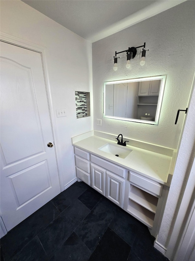 bathroom with vanity and tile patterned floors