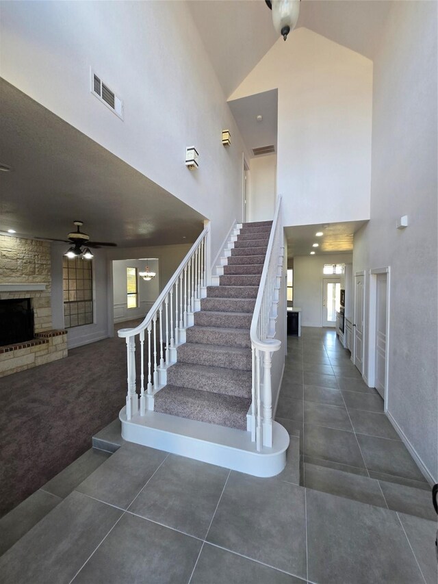 stairs with tile patterned flooring