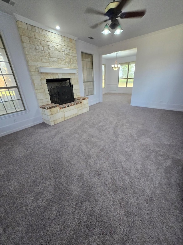 16536 County Road 221, Forney, TX 75126 - unfurnished living room featuring carpet flooring, ceiling fan with notable chandelier, a textured ceiling, and a fireplace