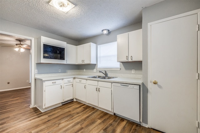 kitchen with white cabinetry, dishwasher, sink, and hardwood / wood-style floors