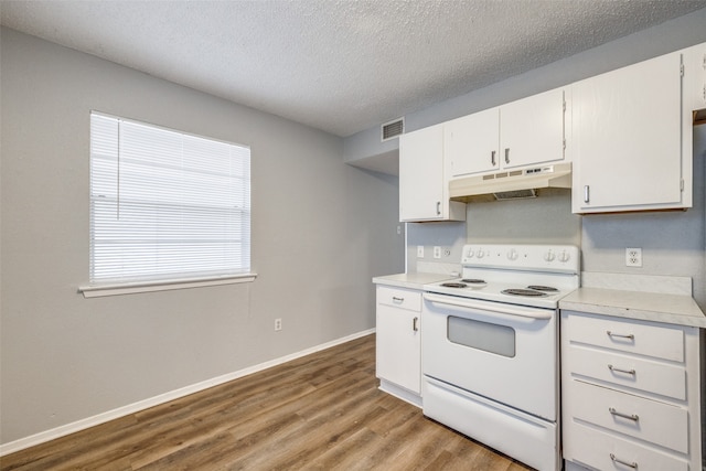 kitchen with a textured ceiling, white cabinets, wood-type flooring, and white electric stove