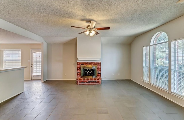 unfurnished living room featuring ceiling fan, a fireplace, and a textured ceiling