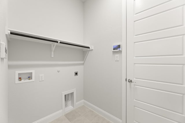 clothes washing area featuring electric dryer hookup, hookup for a washing machine, and hookup for a gas dryer