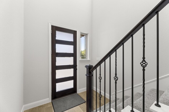 entrance foyer with light hardwood / wood-style flooring