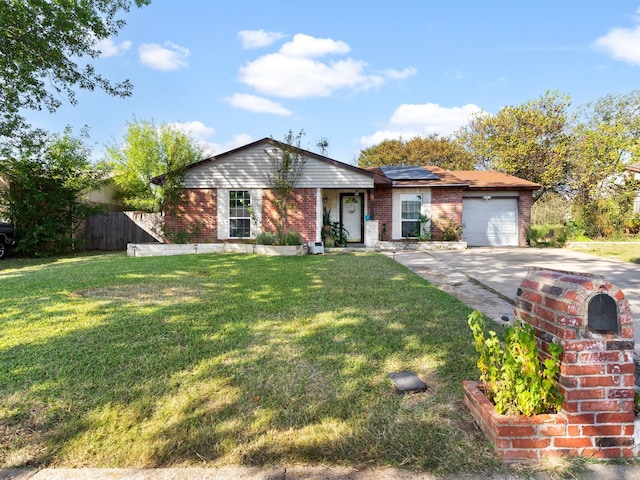 single story home featuring a garage, a front lawn, and solar panels