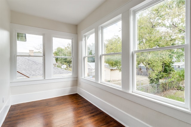 unfurnished sunroom with a healthy amount of sunlight