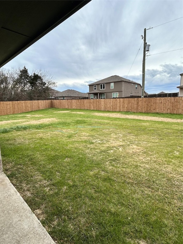 view of yard with fence