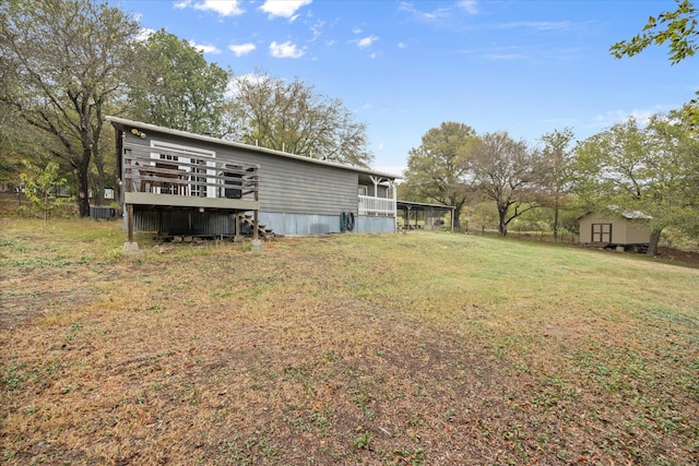 view of yard featuring a wooden deck