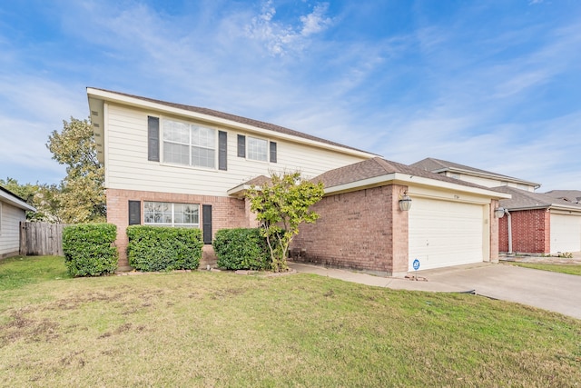 view of property featuring a garage and a front lawn