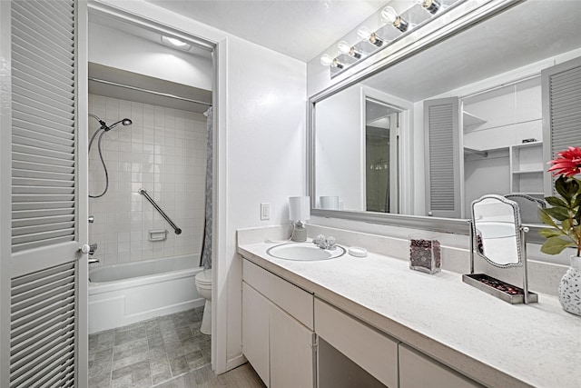 full bathroom featuring vanity, shower / bath combination with curtain, and toilet