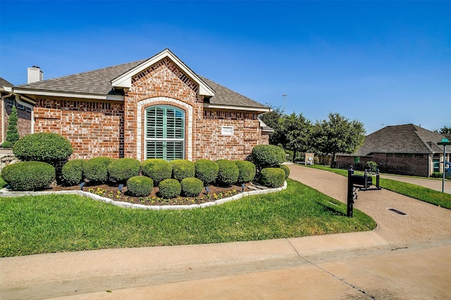 view of home's exterior with a lawn