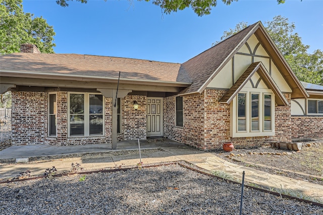 back of house with a patio area