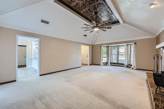 unfurnished living room featuring carpet flooring, ceiling fan, and lofted ceiling