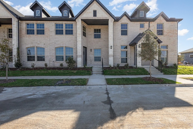 multi unit property with brick siding