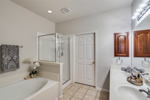 bathroom with tile patterned flooring, vanity, and independent shower and bath