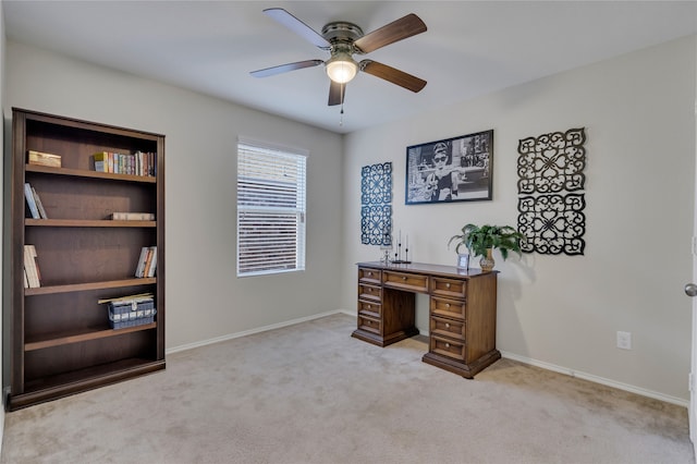 office with ceiling fan and light colored carpet