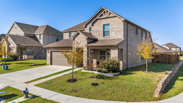 view of front of property with a garage and a front lawn