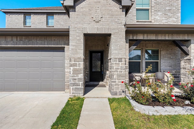 entrance to property featuring a garage