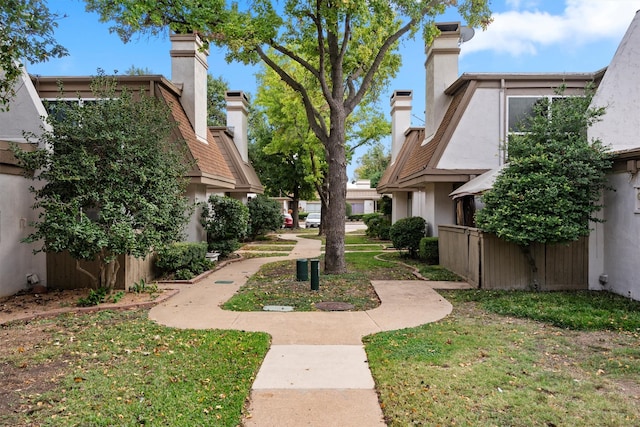 surrounding community featuring a yard