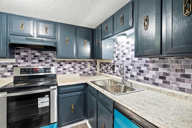 kitchen featuring a textured ceiling, appliances with stainless steel finishes, sink, and backsplash