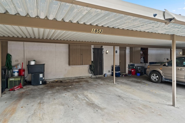 garage featuring a carport