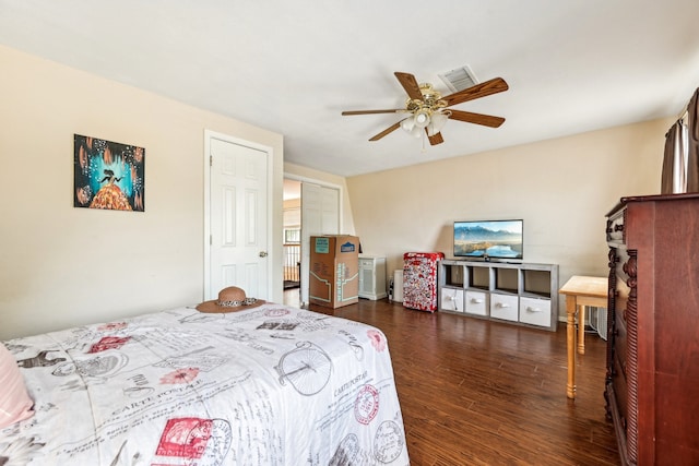 bedroom featuring dark hardwood / wood-style floors and ceiling fan