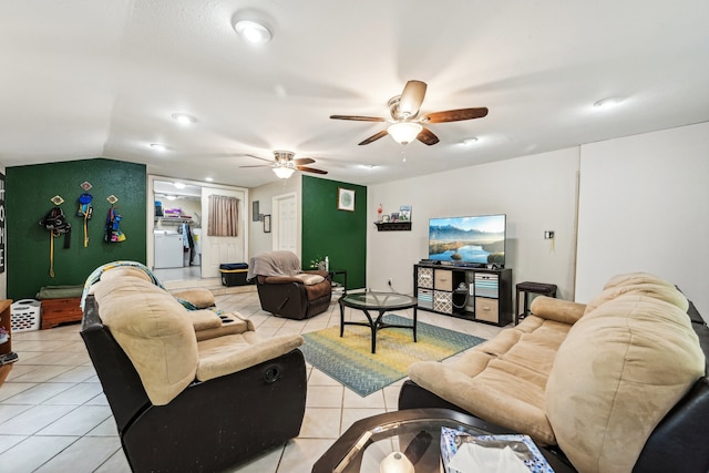 living room featuring ceiling fan and light tile patterned floors