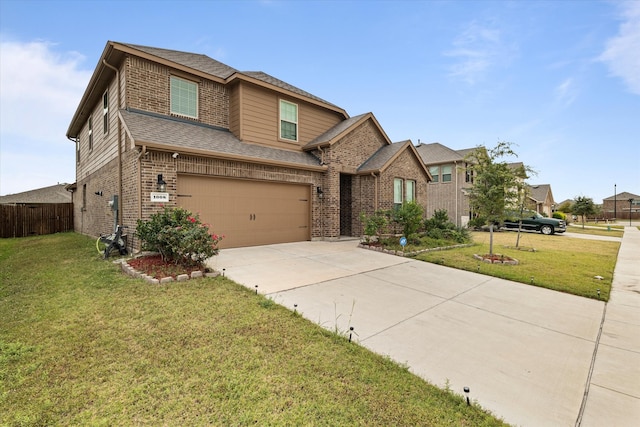 craftsman house featuring a front yard and a garage