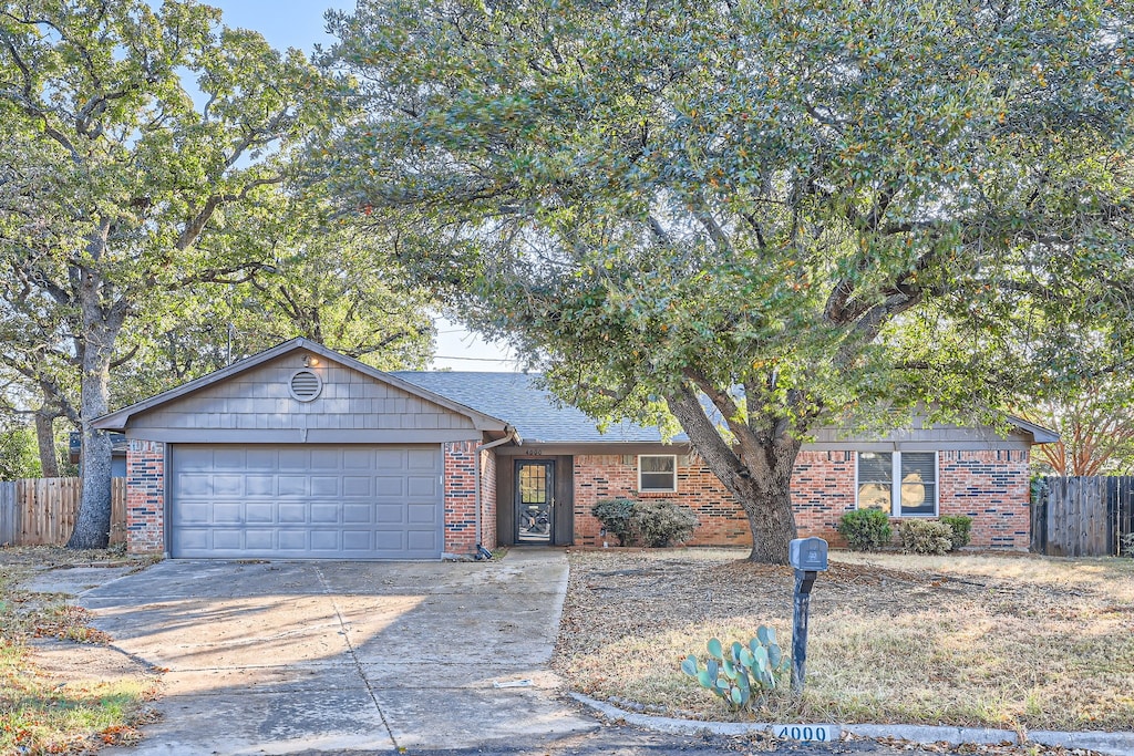 single story home featuring a garage