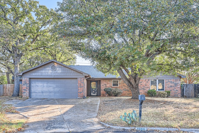 single story home featuring a garage