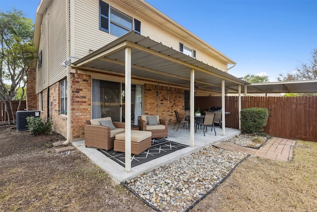 back of house with cooling unit and a patio