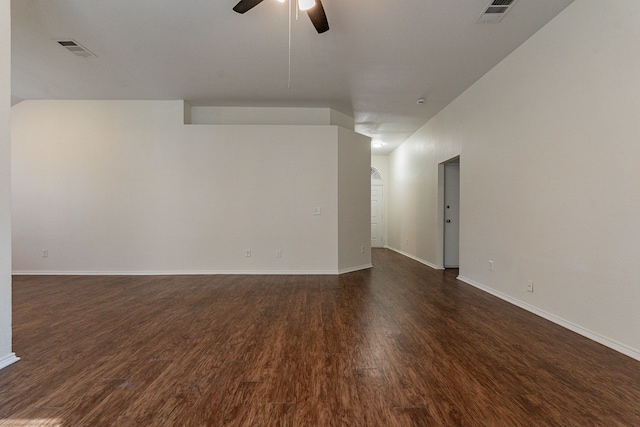 unfurnished room with ceiling fan and dark hardwood / wood-style flooring