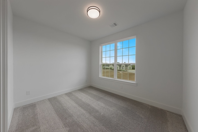 unfurnished room with carpet