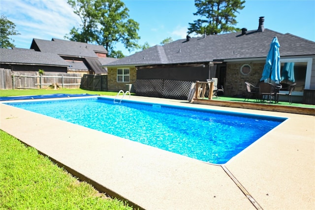 view of pool featuring a patio