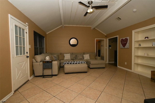 unfurnished living room featuring lofted ceiling with beams, ceiling fan, built in shelves, and light tile patterned floors