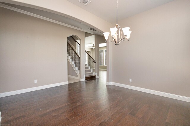 unfurnished living room featuring ceiling fan, dark hardwood / wood-style floors, sink, and a wealth of natural light